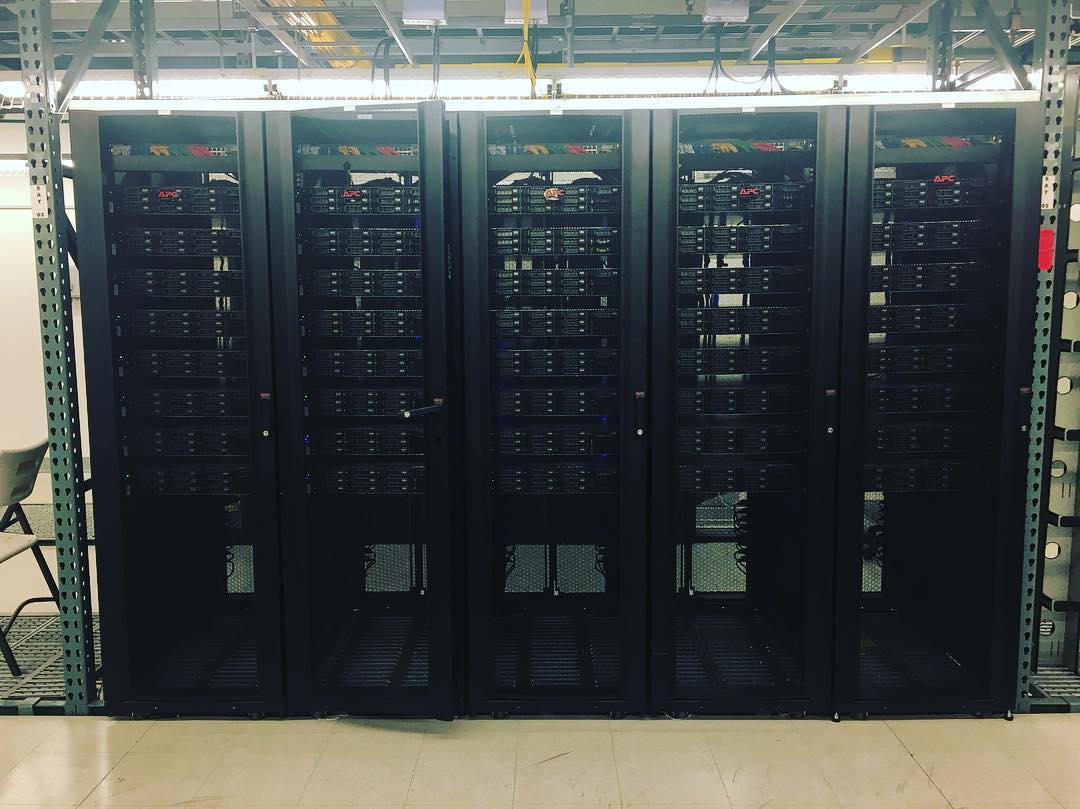 Server racks inside a data center, photographed in 2016.