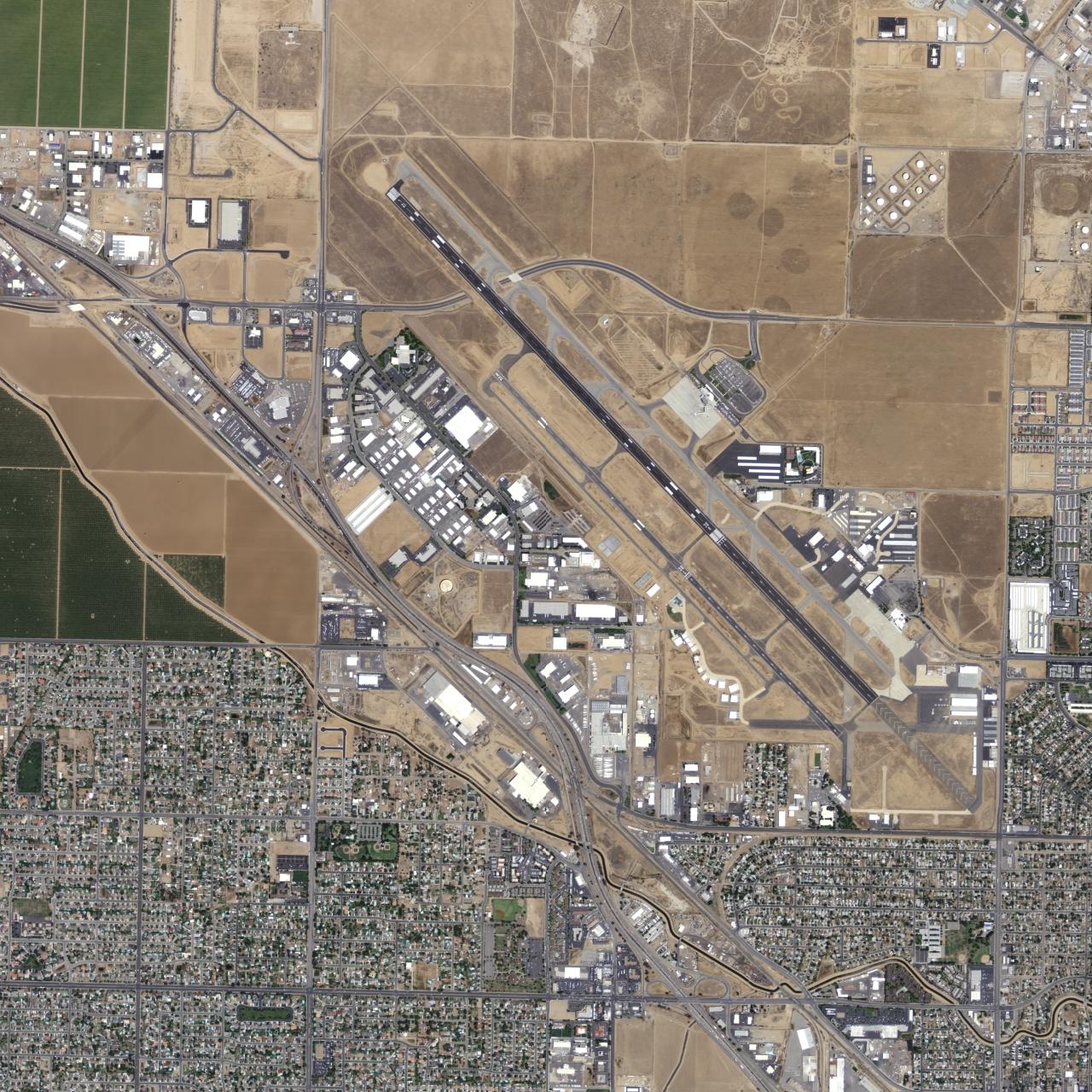 USGS aerial photograph of Meadows Field Airport and surrounding streets and neighborhoods in 2006.