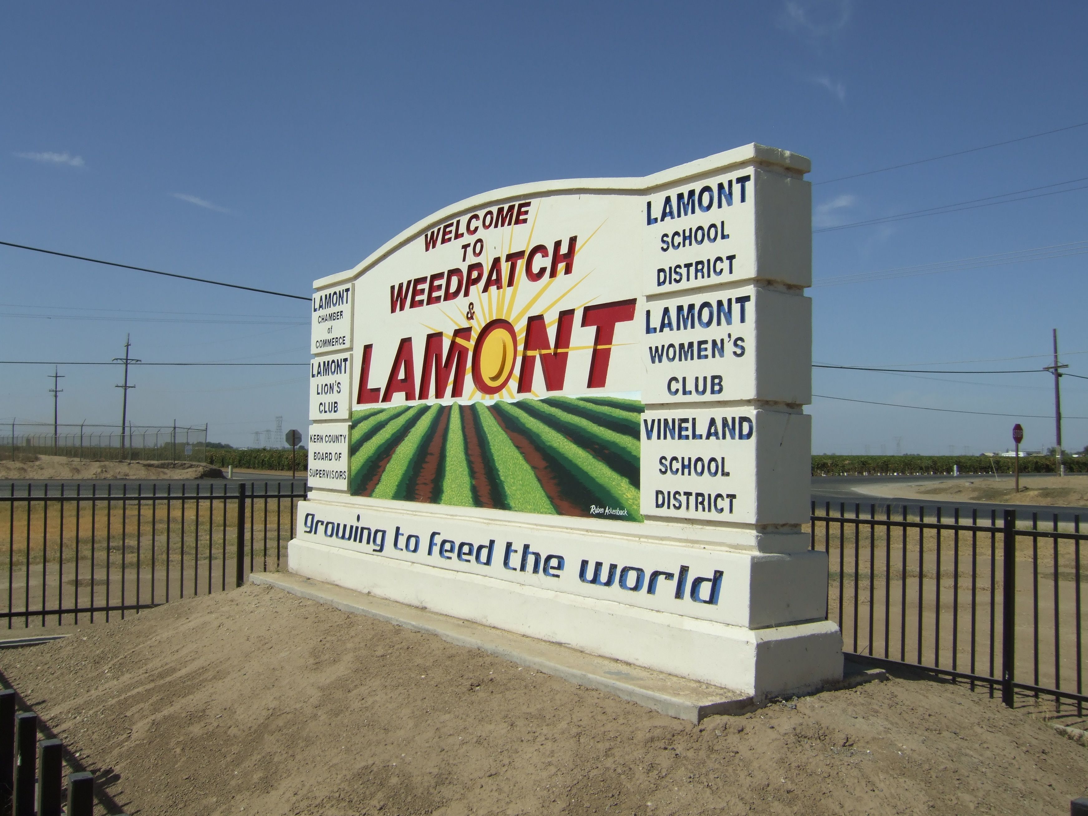 Welcome sign for Weedpatch and Lamont on State Route 184, photographed October 7, 2012. Geographic context; this is not a stormwater district facility or a photograph of flooding.