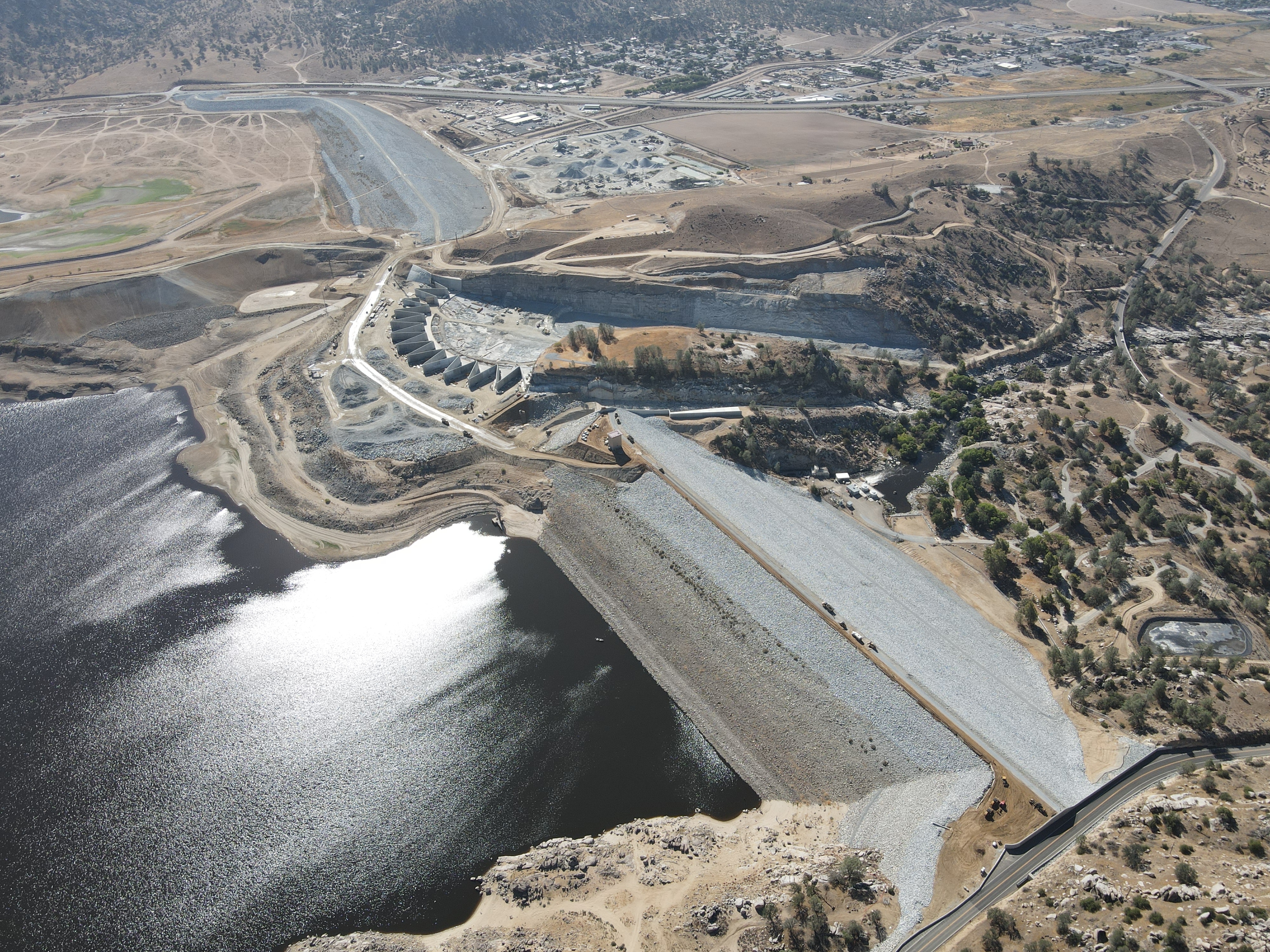 Aerial view of Isabella Dam and spillway construction in Kern County in September 2022. Archival flood-control context, not a flood event or evidence of any property's insurance status.