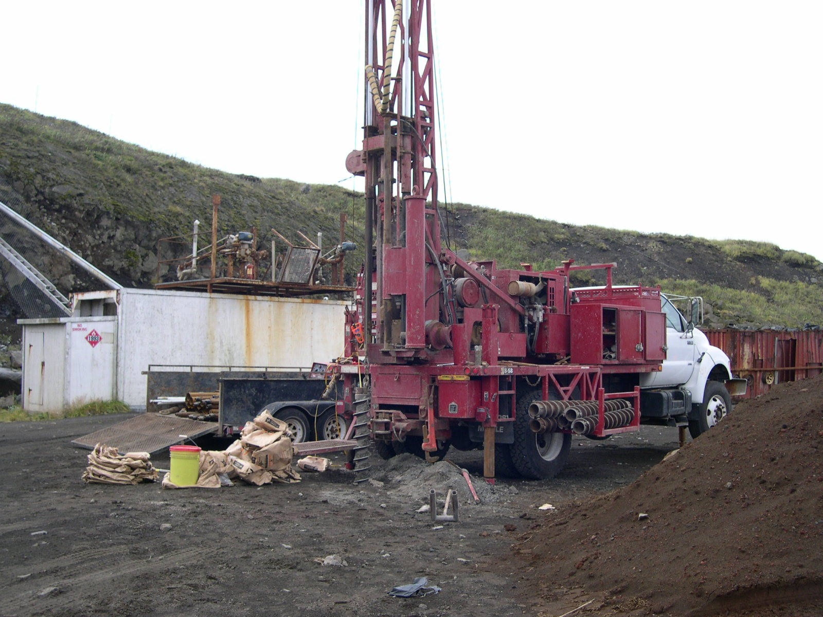 Drilling a groundwater monitoring well on St. Paul Island, Alaska, September 23, 2003. Monitoring-infrastructure context; not one of the Kern County landfills or wells described in this report. Photo: Nir Barnea / NOAA / National Archives, public domain.
