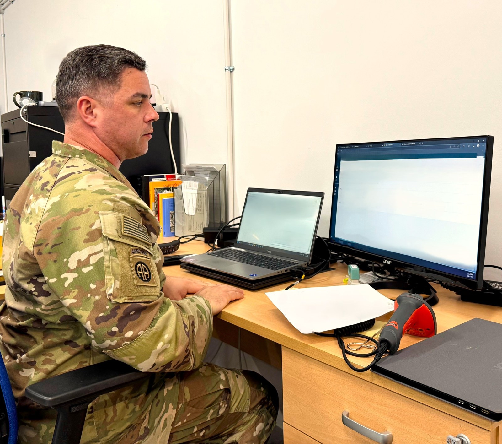 Army physician assistant Jason McCormick uses the PhoenixMed electronic health record platform, August 12, 2025. Electronic-records context; this is not a Kern County employee, CalMHSA implementation or the county’s contracted system. Photo: Kirk Frady / U.S. Army, public domain.