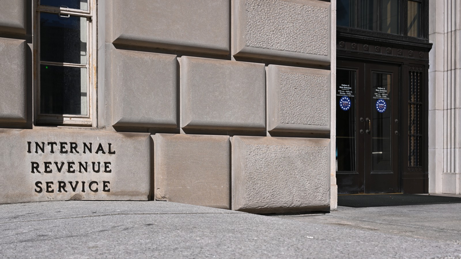 Entrance to the Internal Revenue Service building at 1111 Constitution Avenue NW, Washington, D.C., photographed October 7, 2026. Agency context; the photograph does not show a tax preparer or an enforcement action. Photo: G. Edward Johnson, CC BY 4.0.