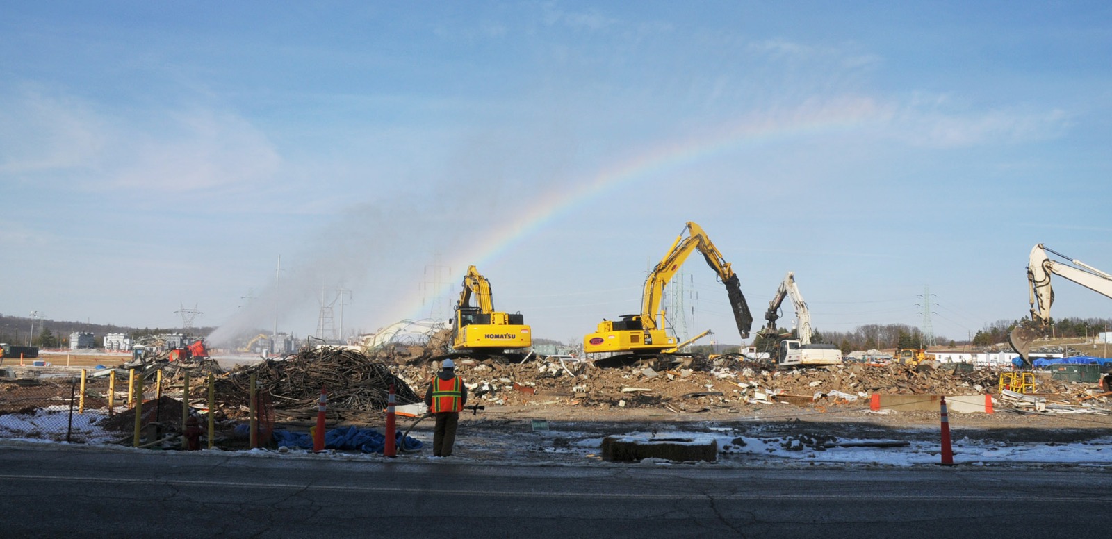 Excavators remove a cooling-tower complex and switchyard at the Portsmouth Gaseous Diffusion Plant, Ohio, December 29, 2010. Archival cleanup context, not present-day site conditions or a reuse approval. U.S. Department of Energy, public domain.