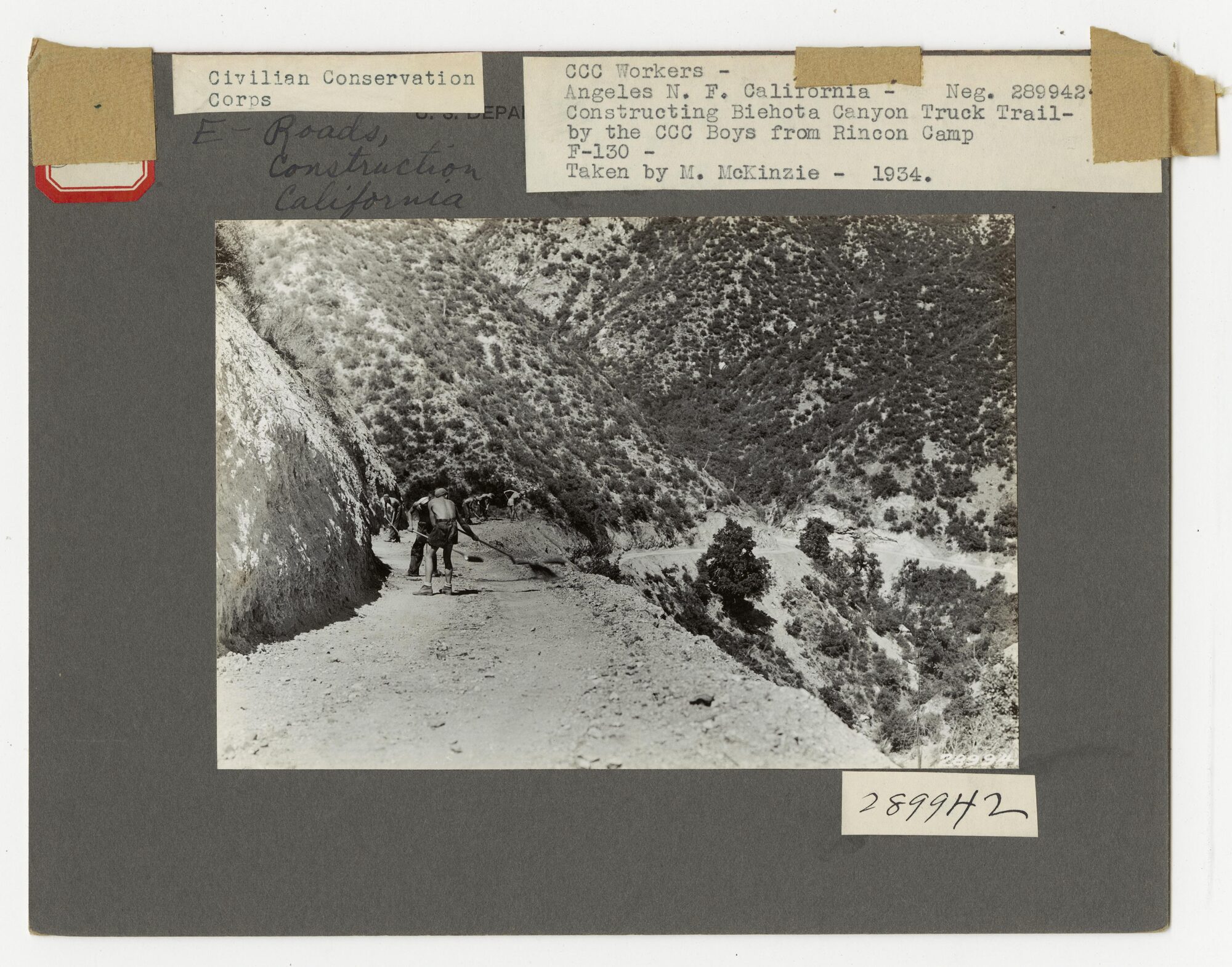 Historical California road construction in a U.S. Forest Service photograph. Context only; not either Kern project and not evidence of current work quality or cost. U.S. National Archives, public domain in the United States.