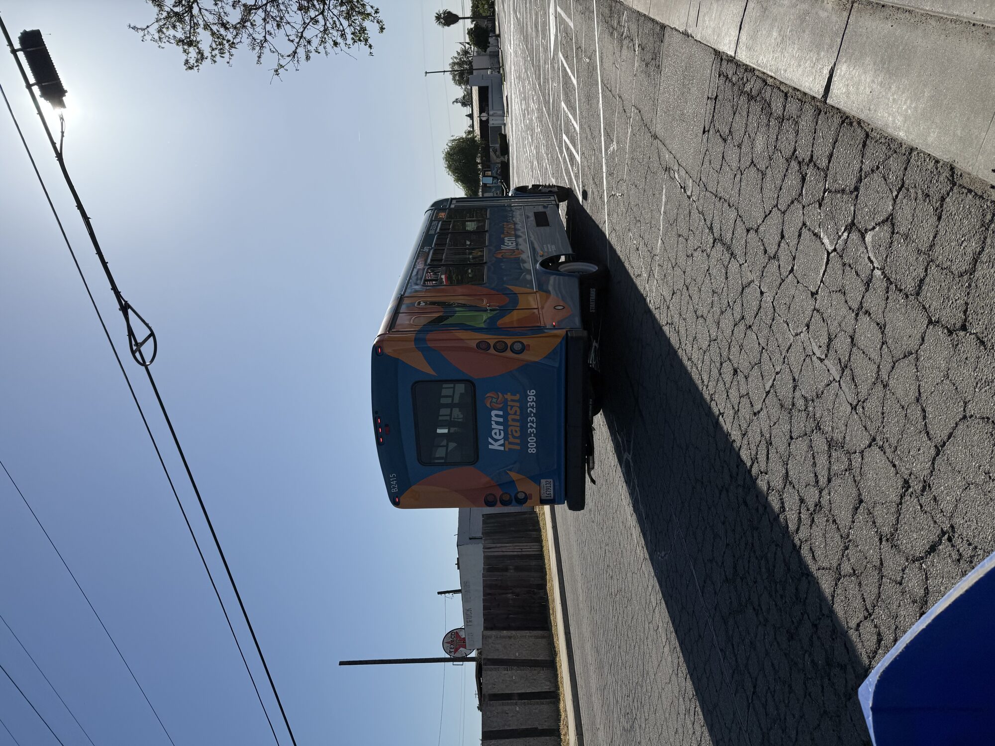 A Kern Transit bus photographed in Kern County in April 2025. Transit context only; it does not depict the proposed Mojave facility or document student ridership. Evan0512 / Wikimedia Commons, CC BY-SA 4.0.