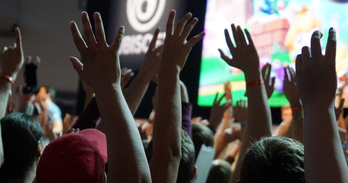 Authentic photograph of a crowd at Gamescom, used as event context and not as an image of the 2026 show