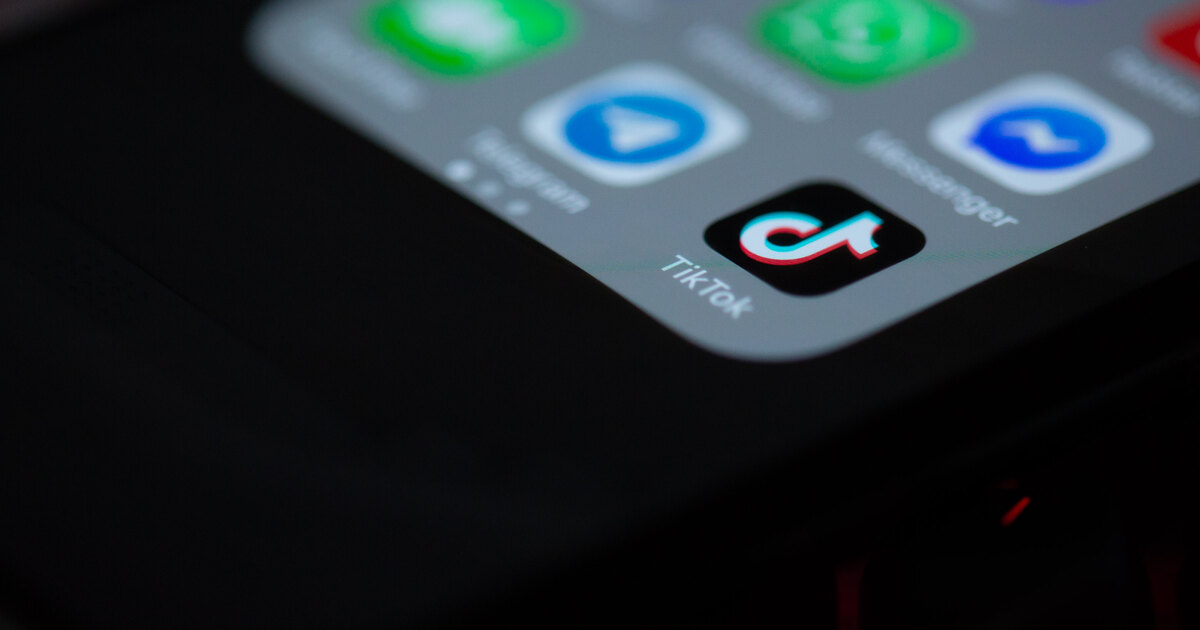 A smartphone displaying a social media app used as contextual imagery for creator platforms